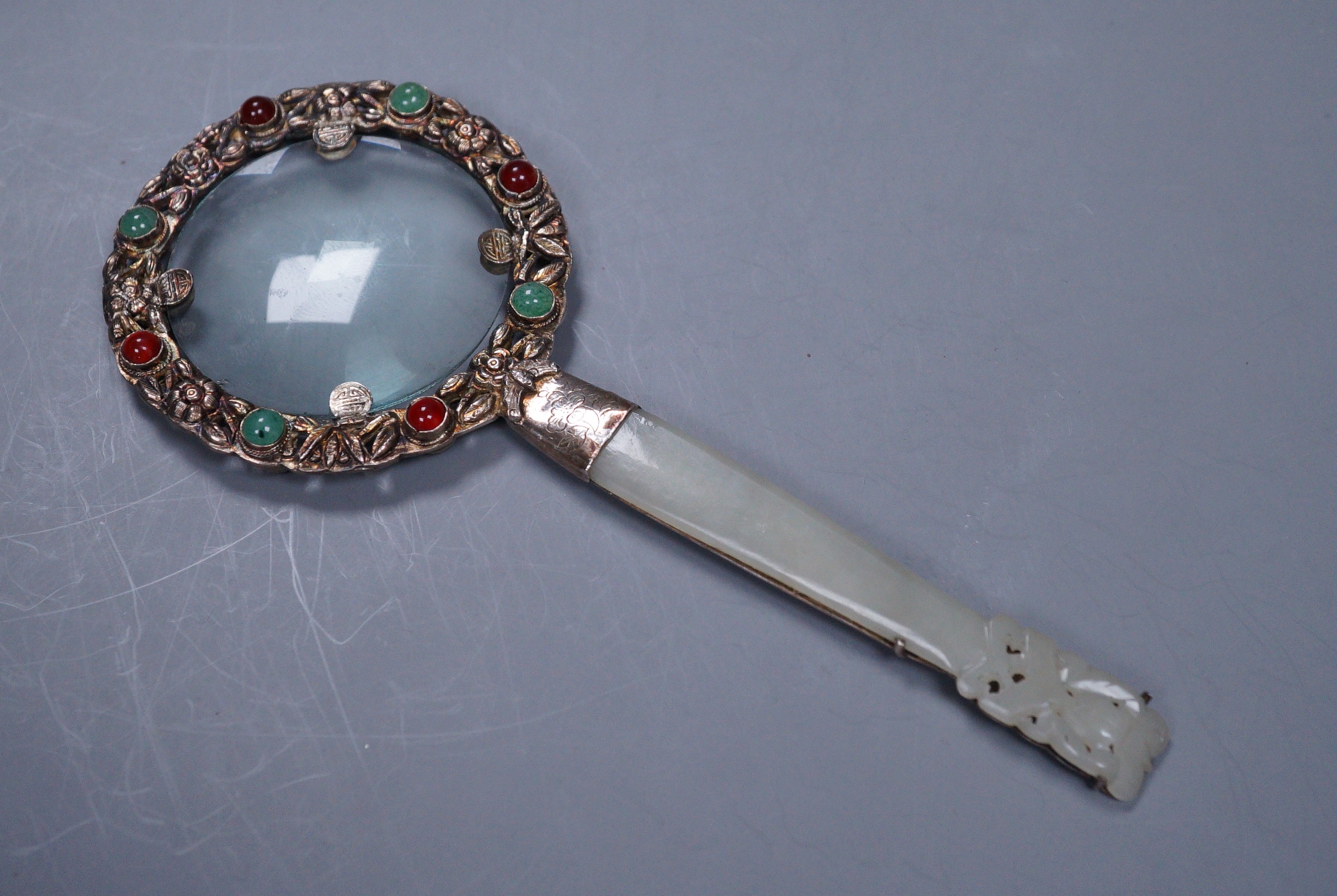 A Chinese jade mounted magnifying glass, 16.5cm